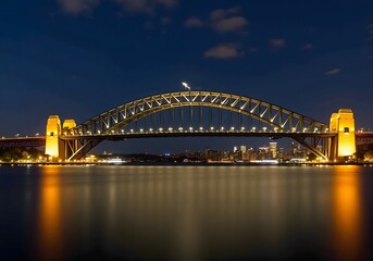 Fototapeta premium Nighttime View of Illuminated Sydney Harbour Bridge