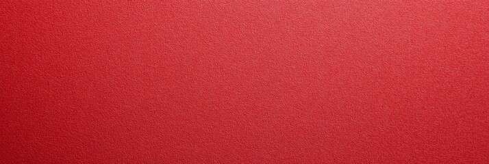 Fototapeta premium Solid red textured background suitable for various artistic and design projects