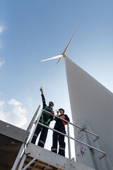 Engineers working on site in wind turbine farm, Wind turbines generate clean energy source, Eco technology for electric, industry environment © surachetkhamsuk