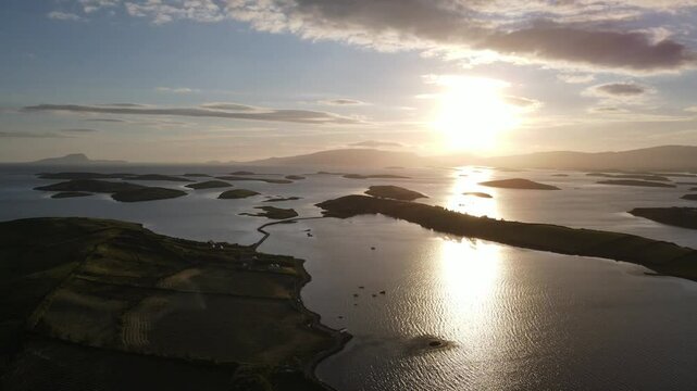 A drone pan showing a stunning sunset among the islands. Clew Bay, Westport, Mayo, Ireland