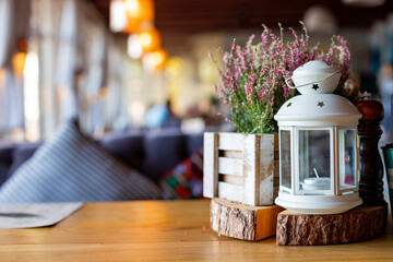 Pink heather in wooden box, gift box with lace bow, candles, vintage style.Autumn decoration.home...