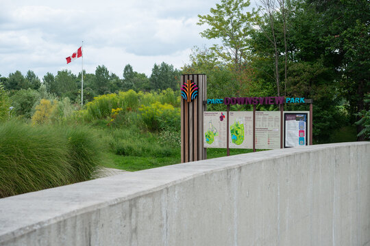 information board signage at Downsview Park, a national urban park at a former military base, principal address at 70 Canuck Avenue in North York (Toronto), Canada