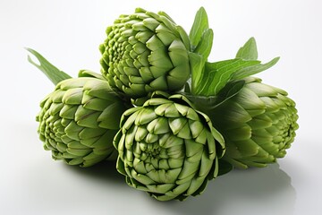 Fototapeta premium Fresh Green Artichokes with Leaves on White Background