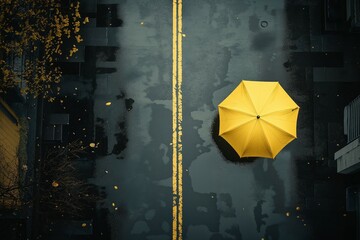 A view from above of a empty street after rain with a yellow umbrella