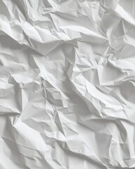 Obraz premium Crumpled white paper texture with intricate folds and shadows in soft natural light
