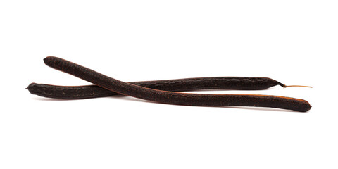 Logs seedpods of Senna spectabilis, golden wonder tree, isolated on white background