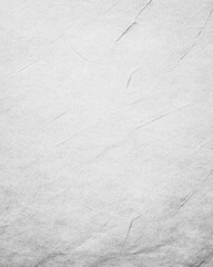 Textured white paper background with subtle wrinkles and natural variations in surface