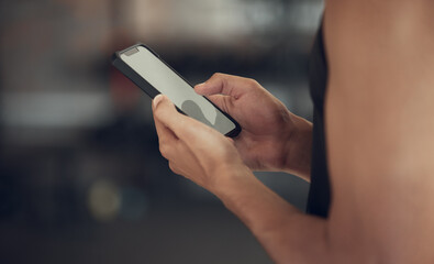 Fitness, hands and phone with screen at gym for tracking workout progress, exercise app or reading notification. Athlete, person and smartphone at sports club for training website and wellness tips