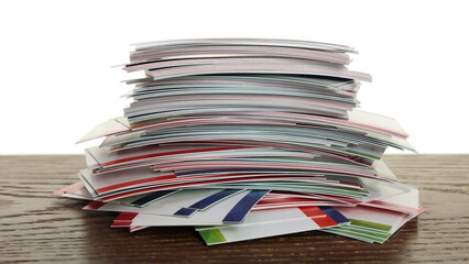 Stack of business cards on wooden table against white background