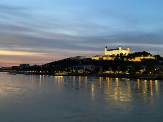 Bratislava Castle and the Danube at night.