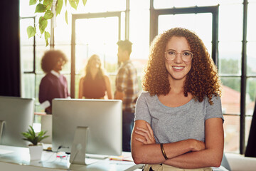 Crossed arms, smile and portrait of businesswoman in office for public relations internship. Happy, confident and female communications employee with pride for entry level job at startup company.