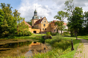 Fototapeta premium Historical Straupe palace on a sunny day in August in Straupe in Latvia