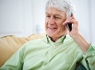 Phone call, happy and senior man in home for communication, contact and conversation. Retirement, relax and elderly person on cellphone for talking, online chatting and speaking in living room