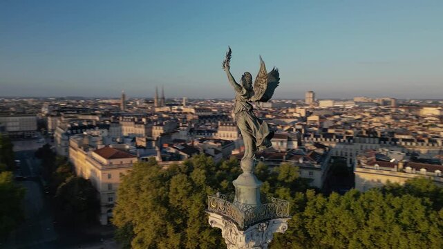 The drone aerial footage of The Girondins Monument and Bordeaux city at sunrise. Monument aux Girondins (The Girondins Monument) is a dramatic fountain statue in Bordeaux.