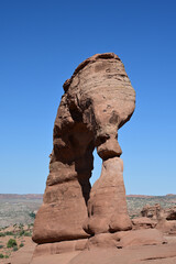 Delicate Arch in Arches National Park near Moab, Utah in clear early morning summer light.