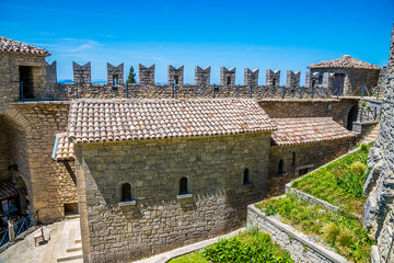 A view over the outer wall and the ramparts in the first tower in the fortified section of San...