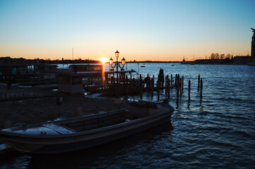 sunrise and gondlas in venice