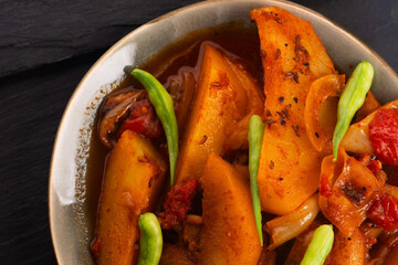 fried potatoes with paprika sauce. crispy fried patata bravas, fried potatoes with smoked paprika sauce