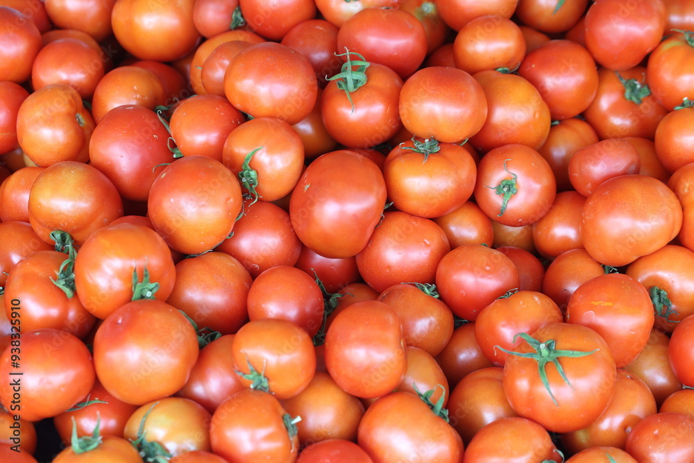 Wall mural close up of ripe tomatoes in the market