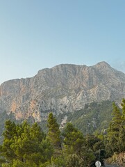 A big mountain against a blue sky