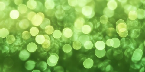 Obraz premium Abstract green bokeh background with soft circular light spots, fresh and lively atmosphere reminiscent of nature and springtime.