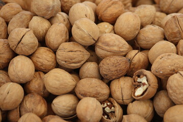 close up of whole walnuts in the market