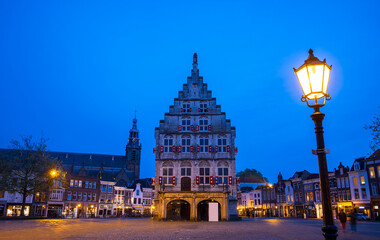 Obraz premium A scenic view of Stadhuis van Gouda, is old City Hall of Gouda in the Netherlands.