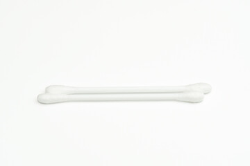 Plastic cotton swabs on white background