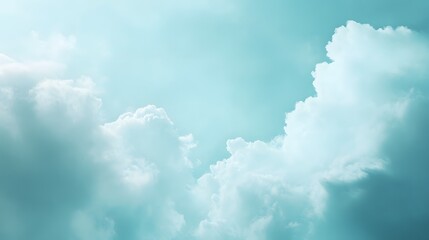 A serene and tranquil sky filled with soft, fluffy clouds in a soothing blue hue. 