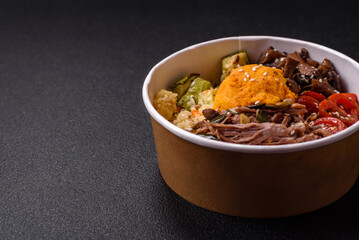 Bowl of food with beef, bulgur, tomatoes, mushrooms, zucchini