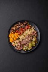 Bowl of food with beef, bulgur, tomatoes, mushrooms, zucchini