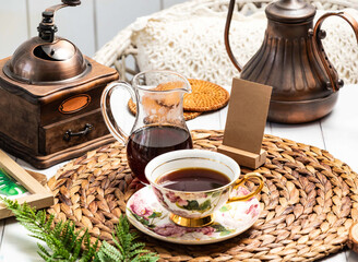 Hand brewed Coffee Light Roast Aromatic Coffee Setup with Vintage Accents served in cup and jug isolated on rustic wooden tray sid view of taiwan coffee hot drink