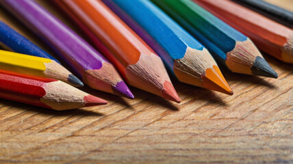 Colored pencils of different shades on the table