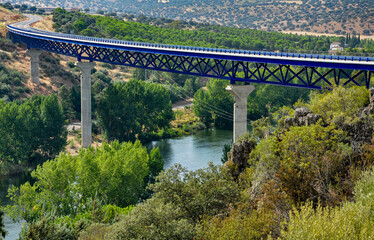 Fototapeta premium Viaduct over the Guadiana river in La Siberia Extremeña at the height of the García de Sola reservoir on the National Road 430, Extremadura, Badajoz province