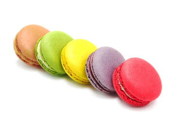 Sweet colorful varied assortment macarons cookies with filling isolated on a white background. Handmade traditional sweets. Clipping Path.