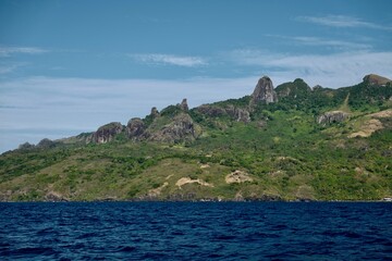 Tropical island with steep cliffs in Fiji