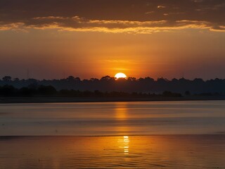 Naklejka premium sunset over the mountains