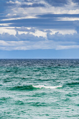 ocean with gloomy sky