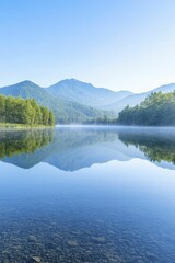 Naklejka premium A tranquil mountain lake mirroring a pristine sky, offering a peaceful opportunity for deep reflection and inner calm.