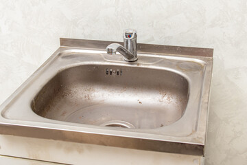 Kitchen sink overhead metal. Dirty old sink
