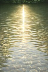 The shimmering rays of sunlight dancing on undulating waves, embodying the spirit of peace and serenity.
