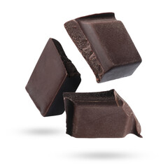 Pieces of sweet chocolate falling on white background