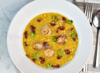 seared scallops  with  cream corn , bacon and scallions.