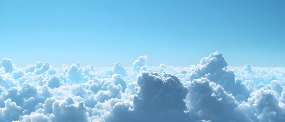 An aerial view of white puffy clouds against a bright blue sky.