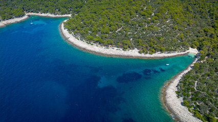 Aerial view of the rocky coast and crystal clear waters, Losinj Island, Croatia