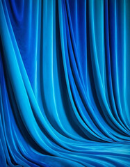 Naklejka premium Curtain with soft smooth flowing folds. Deep blue color and luxurious texture create a dramatic and elegant atmosphere. Decoration and interior design. Expensive curtain made of rich fabric. AI