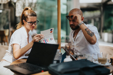 Startup team in a business meeting discussing, brainstorming, analyzing, and strategizing project ideas. Professional environment with focused colleagues and productive collaboration.