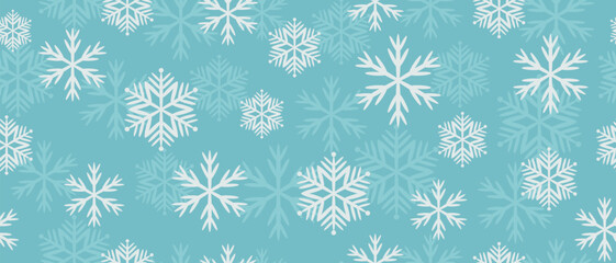 Seamless pattern of winter snowflakes. Christmas snow print on soft blue background. New Year texture for print, wrapping paper, fabric, decor, background.