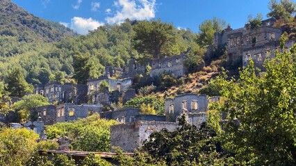 Kayak&ouml;y ghost town, old abandoned Greek village. View of ancient city on the beautiful green slope of the hill