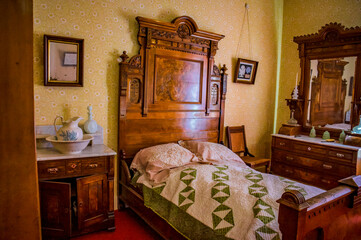 Bedroom in a restored old pioneer home